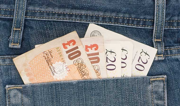£10 and £20 notes in jeans pocket