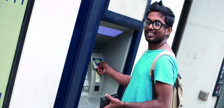 Man using ATM