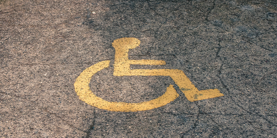 Yellow Handicapped Symbol Of Wheelchair