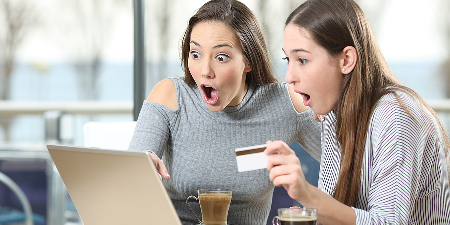 Young women buying a bargain online