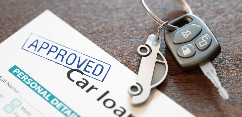 Car keys with loan paperwork