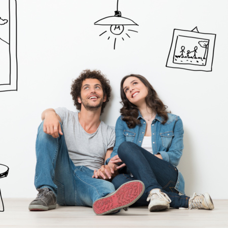 Couple sitting in sketch of new home