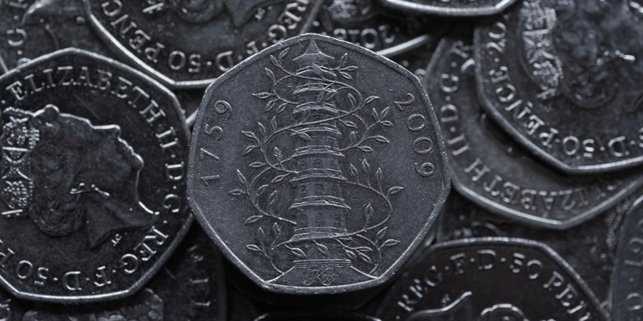 A stack of 50 pence pieces