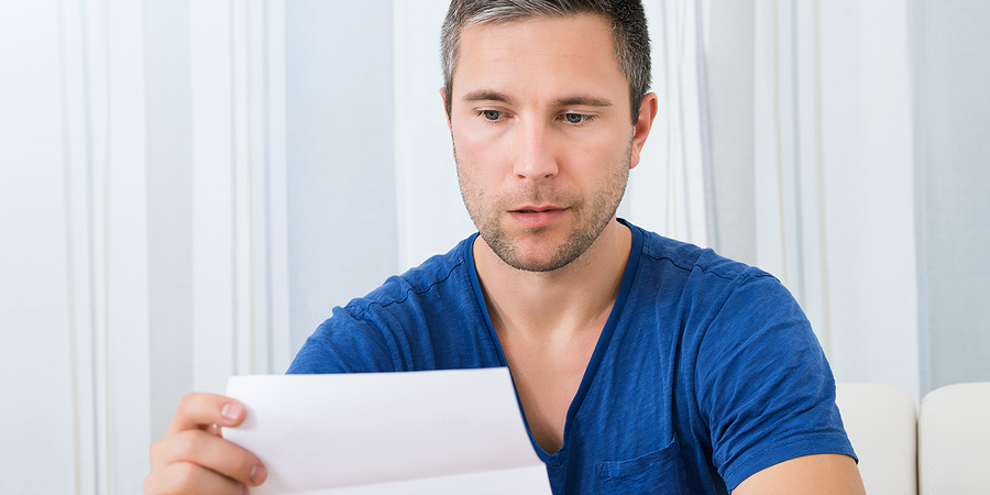 Man reading a letter